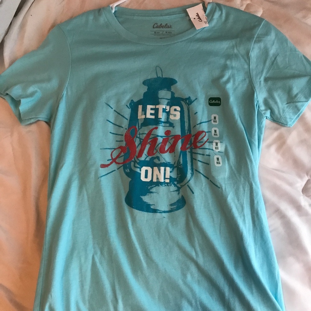 A blue Cabela shirt